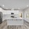 kitchen with an island, modern appliances and spacious counter-space