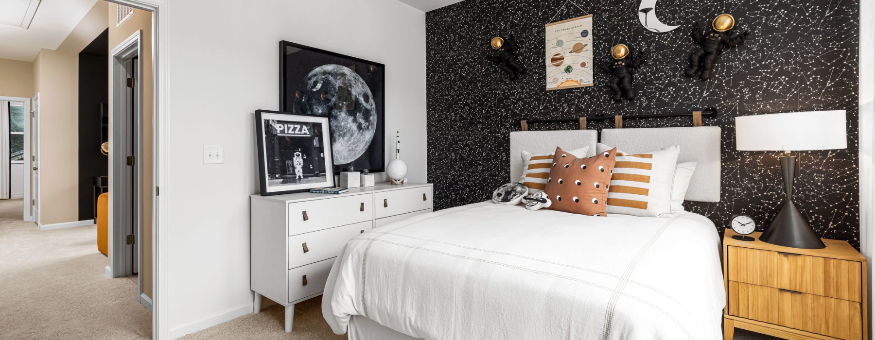 bedroom with a bed dresser and side table 