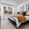 Bedroom with natural lighting and high ceilings
